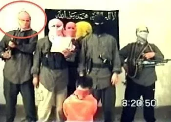 2004: Jama'at al-Tawhid wal-Jihad insurgents beheading Kim Sun-Il. Abu Hamza al-Muhajir is circled. Credit: Daniele Raineri on Twitter.