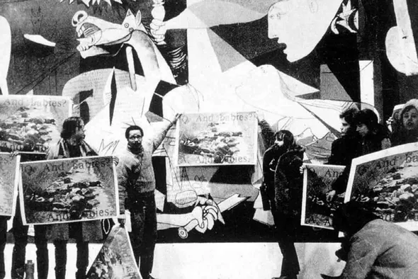 Fig. 3. Art Workers’ Coalition Vietnam War protest in front of Pablo Picasso, Guernica (1937), at Museum of Modern Art, 1970. Photo: Jan van Raay.