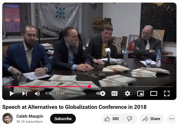 Dugin (second from left) seated next to Maupin at the anti-globalization conference. 