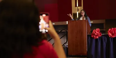 Nicholas-Weber-Rashida-Speaking-Member-Records-on-Phone-1024x683