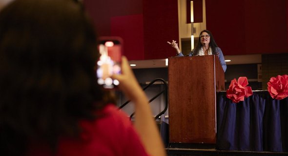 Nicholas-Weber-Rashida-Speaking-Member-Records-on-Phone-1024x683