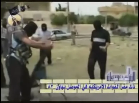 Mujahidin Shura Council insurgents fire mortars at an American base in Mosul.