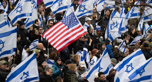 us_and_israeli_flags_rally_central_park_2078451970