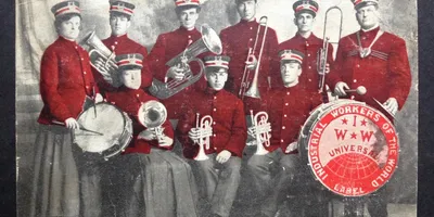 x 1909 IWW Band Postcard a
