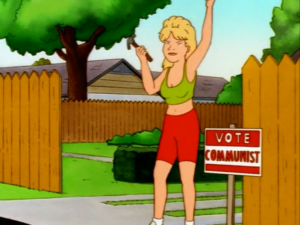 Luanne from the TV show King of the Hill standing next to a sign reading "Vote Communist"