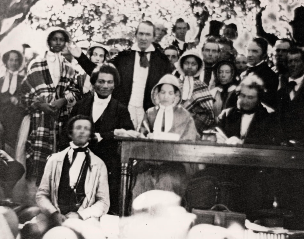 A daguerreotype of the Fugitive Slave Law Convention at Cazenovia, New York, on 22 August 1850, Douglass seated at left. Photograph: The Art Archive/Rex/Shutterstock. Originally included in the Guardian (10/28/2018).